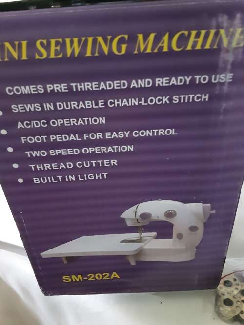 MINI ELECTRIC SEWING MACHINE WITH DOUBLE THREADS & 2 SPEED CONTROLS AND EXTENDED TABLE