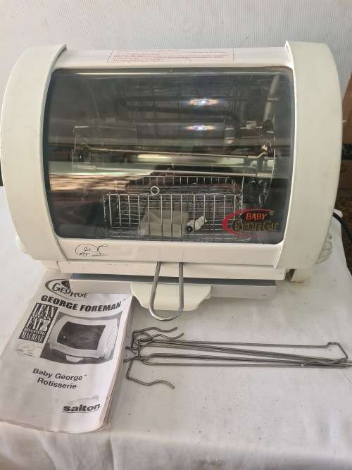 GEORGE FOREMAN ROTISSERIE(LEAN MEAN FAT ROASTING MACHINE)UNUSED