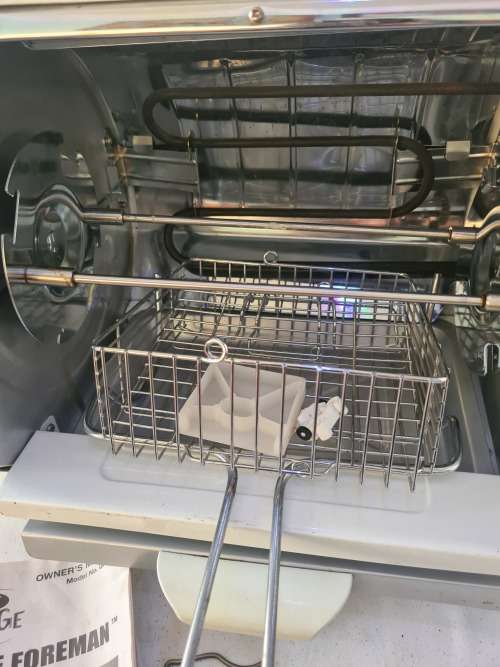 GEORGE FOREMAN ROTISSERIE(LEAN MEAN FAT ROASTING MACHINE)UNUSED