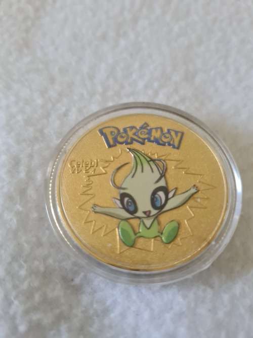 POKEMON GOLDPLATED COMMEMORATIVE COIN(CELEBI)ENCAPSULATED