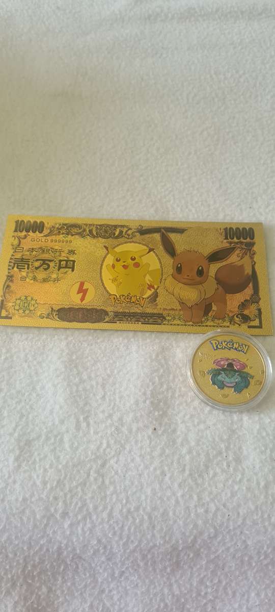24 K GOLD POKEMON NOTE AND A POKEMON COIN