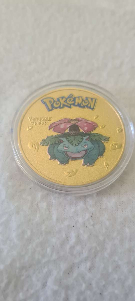 24 K GOLD POKEMON NOTE AND A POKEMON COIN