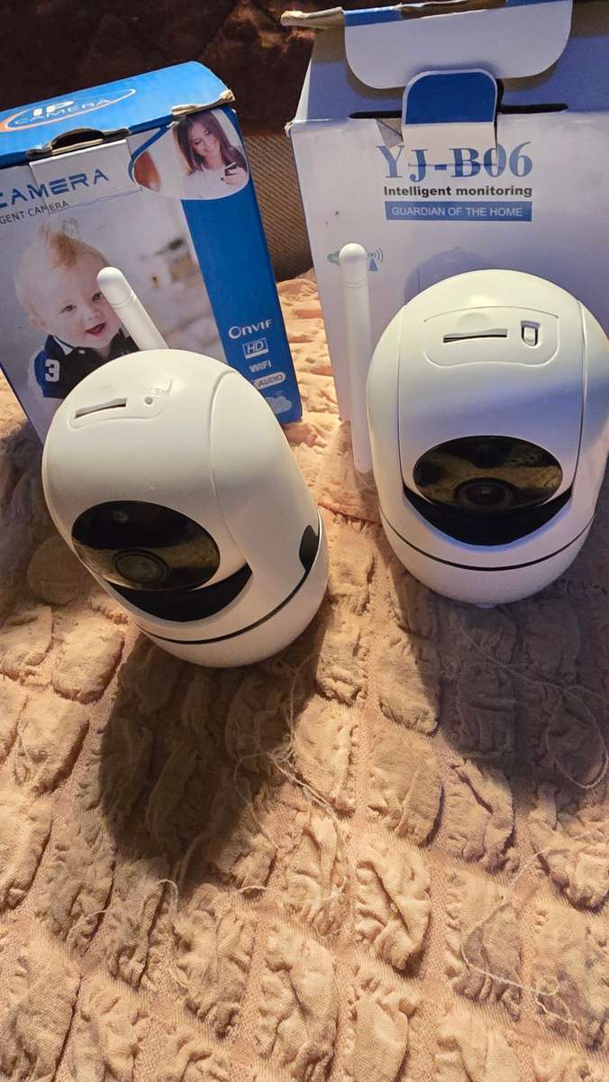 2 X SMART SECURITY CAMERAS