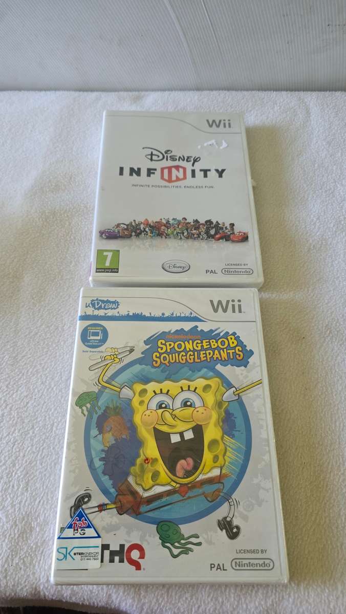 NINTENDO WII CONSOLE INCL.POWER SUPPLY,9 GAME DISC AND ALL ASSESCORIES AS PER PHOTOS