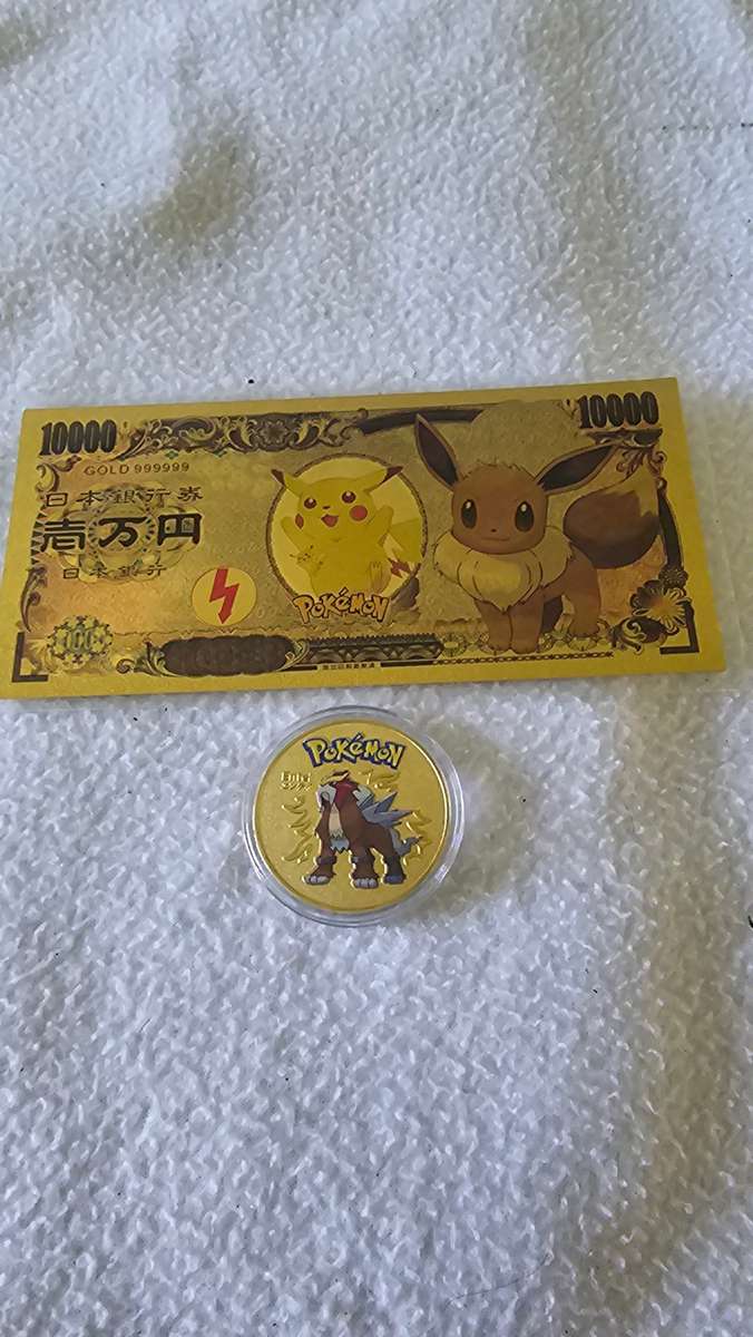 24K GOLD POKEMAN NOTE AND A POKEMAN COIN