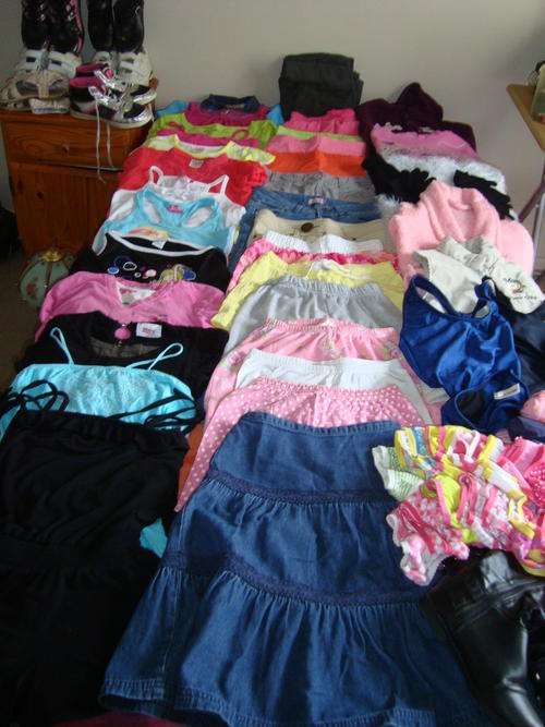 GIRLS SHORTS, TOPS, SWIM SUITS, LONG PANTS etc.... for ages 7 to 12 years - 64 pieces