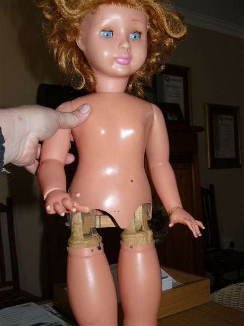 Very old walking doll still in excellent condition - and she still walks !!!