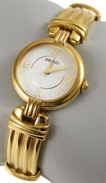 Seiko gold toned quartz - Bangle type bracelet