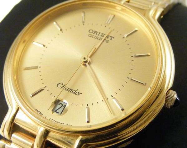 Stylish Orient Chandor gold toned quartz with date display bobshop .za