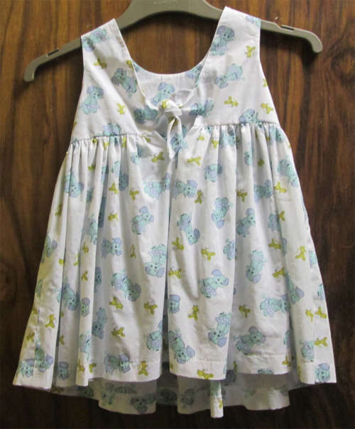 White Dress with Little Blue Elephants & Yellow Teddies (+-2 Years)