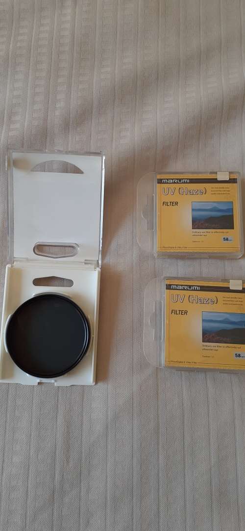 Canon Zoom Lenses with Filters and Backpack.