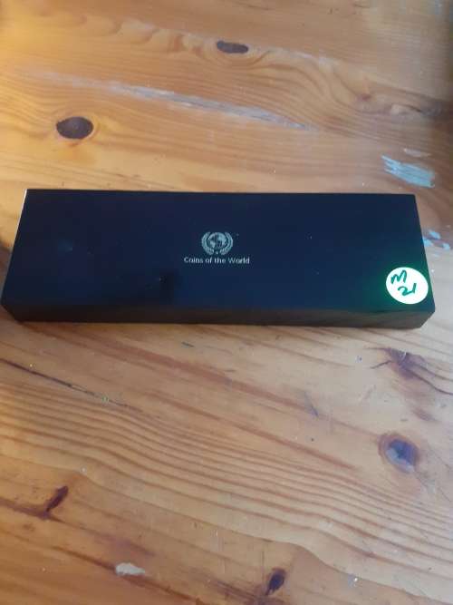 Wooden Coin Holder Box. Coins of the World