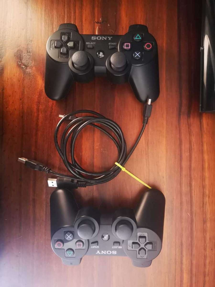 PS3 - 12GB Super Slim Console + 2 Controllers + Move Controller + Games