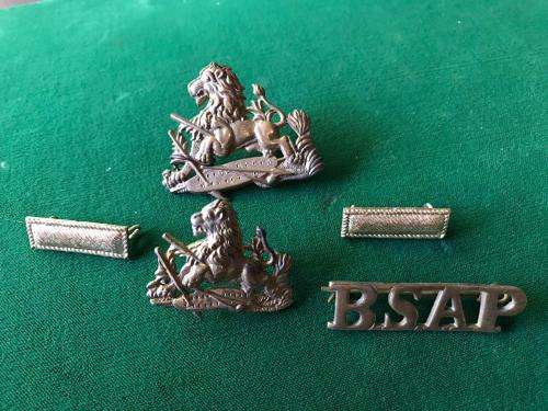 RHODESIAN BSAP BRASS CAP & SHAKO BADGE WITH 2 RANKS & ONE TITLE 19553-1970'S-ONE LUG MISSING