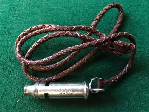 VINTAGE SAP MARKED WHISTLE WITH LEATHER LANYARD