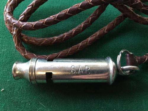 VINTAGE SAP MARKED WHISTLE WITH LEATHER LANYARD