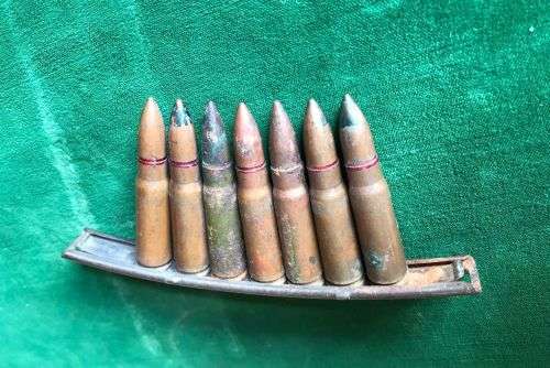 7,62 MM X 39 AMMO ON 10 ROUND STRIPPER DIP FOR THE SOVIET SIMONAV SEMI AUTOMATIC CARBINE (SKS