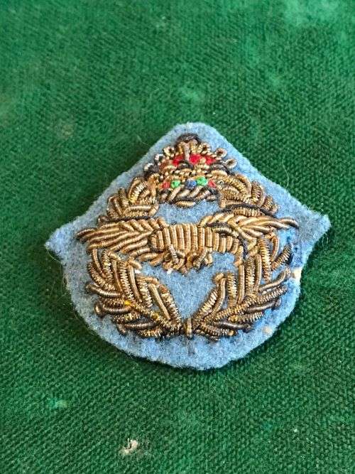SAAF GOLD BULLION COLLAR BADGE WITH BLUE BACKING- 1920`S