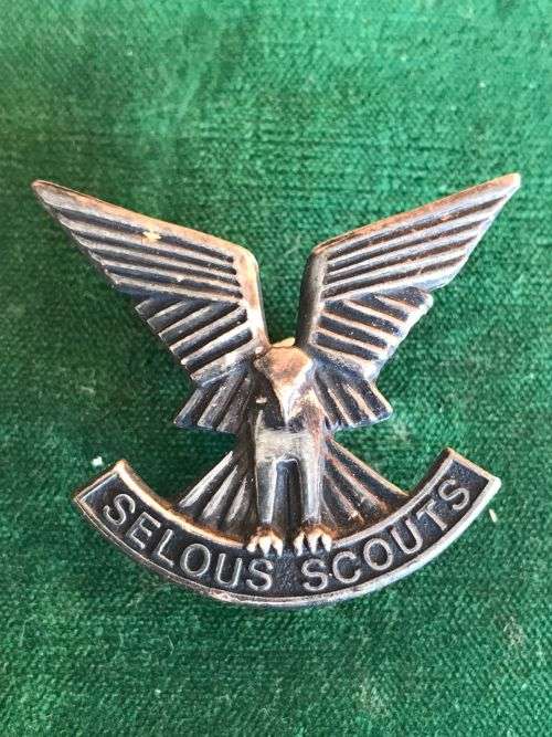 RHODESIA SELOUS SCOUTS. OFFICERS,SILVER (MARKED) CAP BADGE-WORN 1974-1980- 2 LUGS-REUTELER MAKERS MA