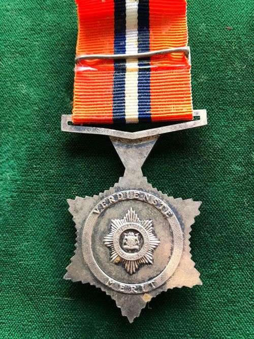 FULL SIZE POLICE STAR FOR MERIT (1963)FOR 30 YEARS SERVICE-THIS IS A SILVER MEDAL NAMED TO H. VAN NI
