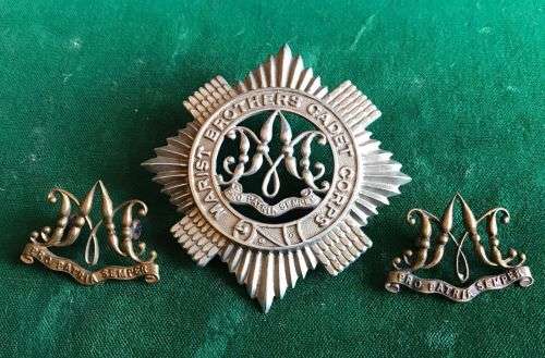 WHITE METAL CAP BADGE FOR THE MARIST BROTHERS CADET CORPS-MEASURES 65X65MM-SOLD WITH THE 2 COLLARS I