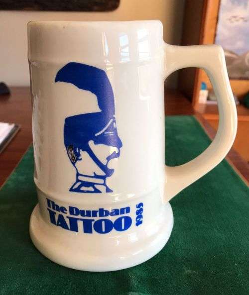 THE DURBAN TATTOO 1985 MUG-HEIGHT 14CM-GOOD CONDITION WITHOUT ANY DAMAGE