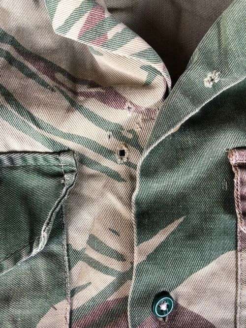 RHODESIA CAMO SHORT SLEEVE SHIRT SIZE MEDIUM-MEASURES 50 CM ARMPIT TO ARMPIT-SOME DAMAGE PLEASE LOOK