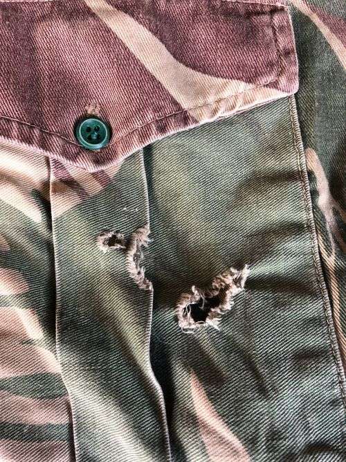 RHODESIA CAMO SHORT SLEEVE SHIRT SIZE MEDIUM-MEASURES 50 CM ARMPIT TO ARMPIT-SOME DAMAGE PLEASE LOOK