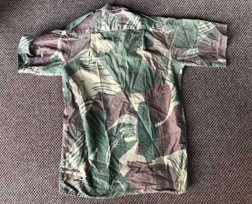 RHODESIA CAMO SHORT SLEEVE SHIRT SIZE MEDIUM-MEASURES 50 CM ARMPIT TO ARMPIT-SOME DAMAGE PLEASE LOOK