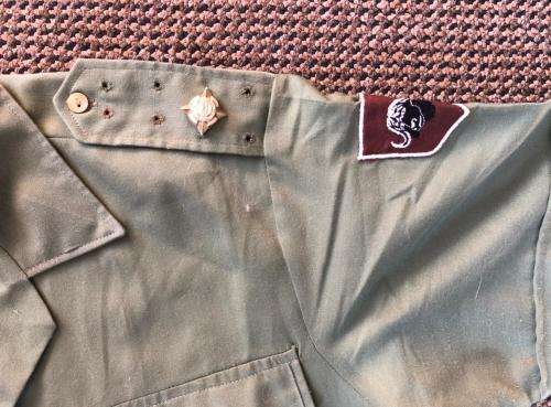 RHODESIAN OLIVE GREEN SHIRT WITH PATCHES AND MAKERS LABEL-SIZE LARGE-MEASURES 55 CM ARMPIT TO ARMPIT