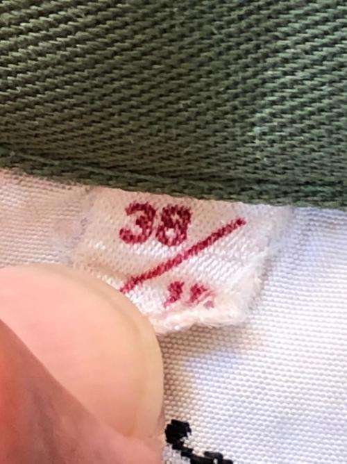 RHODESIAN OLIVE GREEN SHIRT WITH PATCHES AND MAKERS LABEL-SIZE LARGE-MEASURES 55 CM ARMPIT TO ARMPIT