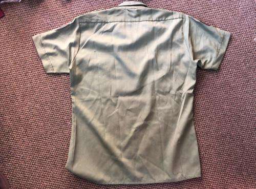 RHODESIAN OLIVE GREEN SHIRT WITH PATCHES AND MAKERS LABEL-SIZE LARGE-MEASURES 55 CM ARMPIT TO ARMPIT