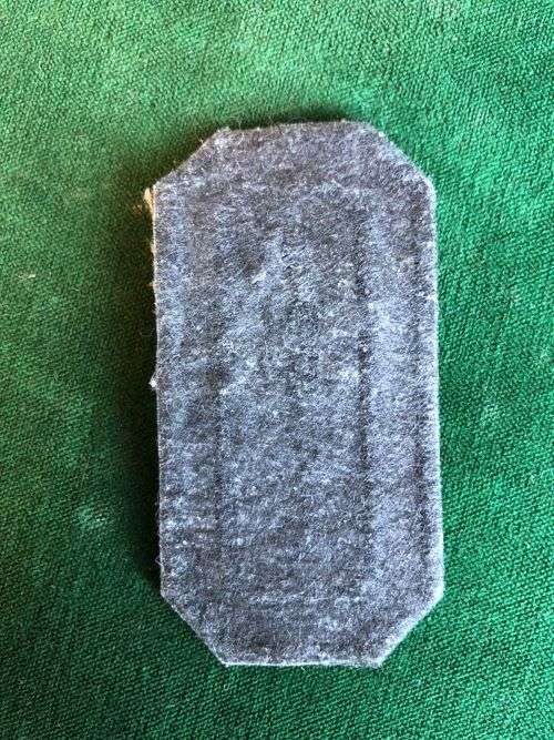 SADF PERIOD MARKSMAN BADGE NUTRIA BACKING WITH BLACK EMBROIDERED BORDER