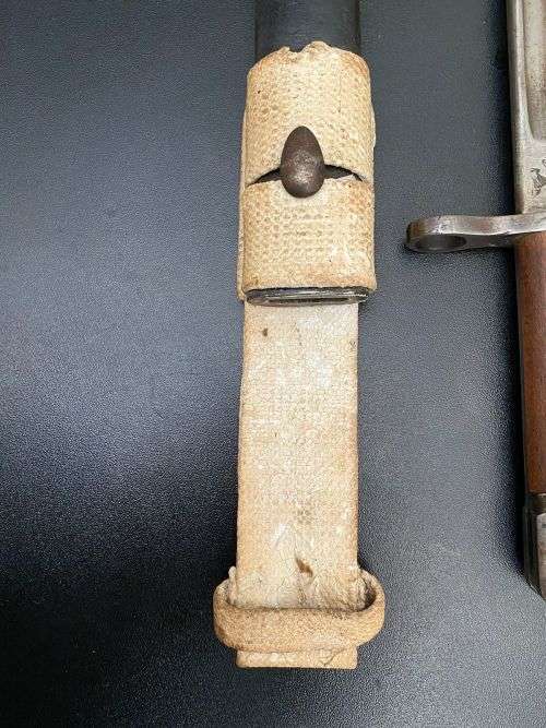 US PATTERN M1917 BAYONET MADE BY REMINGTON,RIGHT RICASSO MARKINGS OF THE US M 1917 BAYONET,SHOWING T