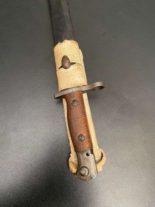 US PATTERN M1917 BAYONET MADE BY REMINGTON,RIGHT RICASSO MARKINGS OF THE US M 1917 BAYONET,SHOWING T