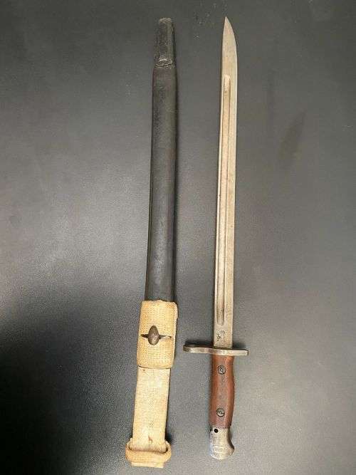 US PATTERN M1917 BAYONET MADE BY REMINGTON,RIGHT RICASSO MARKINGS OF THE US M 1917 BAYONET,SHOWING T