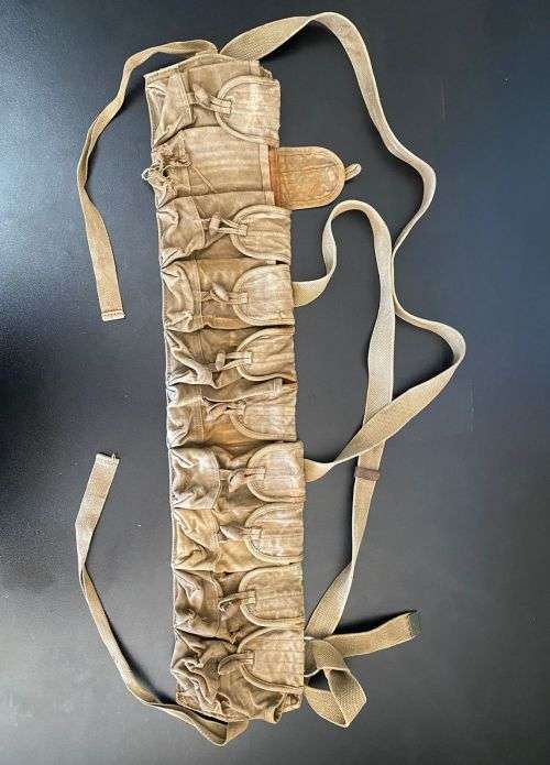 VINTAGE AND AUTHENTIC CHICOM CHEST RIG WITH 10 POUCHES,BATTLE WORN AND FROM A FORMER RHODESIAN SOL