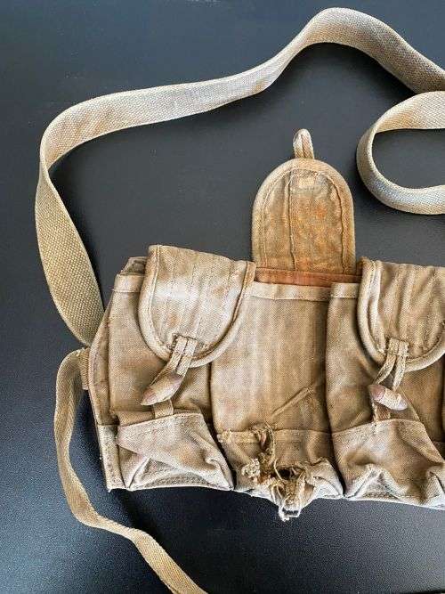 VINTAGE AND AUTHENTIC CHICOM CHEST RIG WITH 10 POUCHES,BATTLE WORN AND FROM A FORMER RHODESIAN SOL
