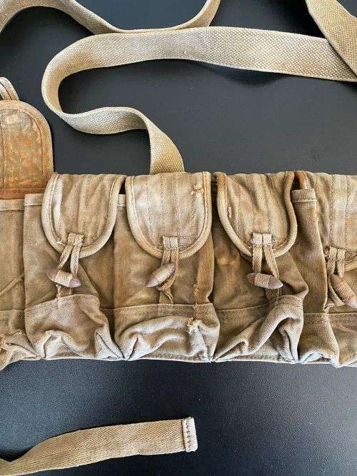 VINTAGE AND AUTHENTIC CHICOM CHEST RIG WITH 10 POUCHES,BATTLE WORN AND FROM A FORMER RHODESIAN SOL