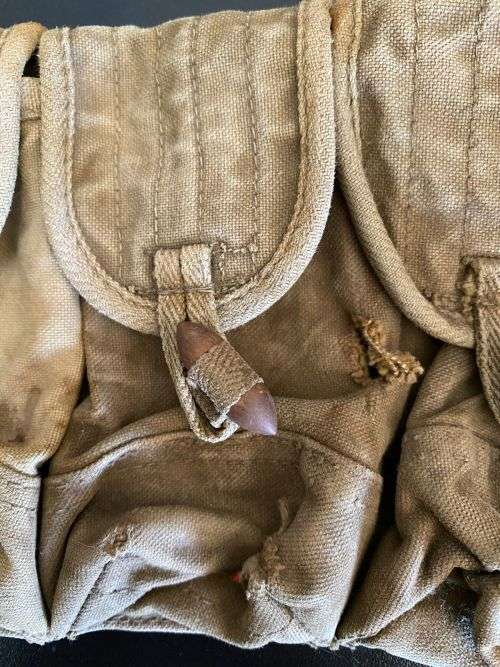 VINTAGE AND AUTHENTIC CHICOM CHEST RIG WITH 10 POUCHES,BATTLE WORN AND FROM A FORMER RHODESIAN SOL