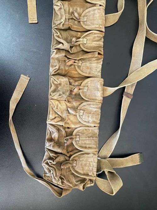 VINTAGE AND AUTHENTIC CHICOM CHEST RIG WITH 10 POUCHES,BATTLE WORN AND FROM A FORMER RHODESIAN SOL