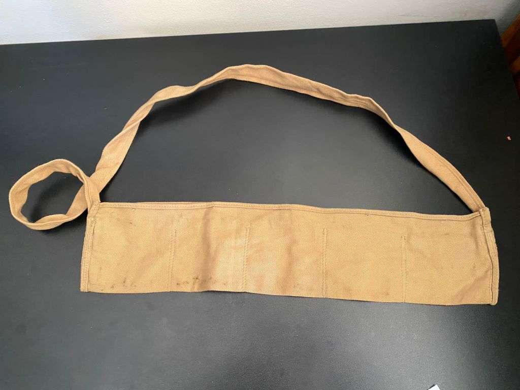 COTTON (DISPOSABLE BANDOLIER) FOR .303 AMMONUTION ,LOADED IN STRIPPER CLIPS-ALSO USED IN RHODESIA BY