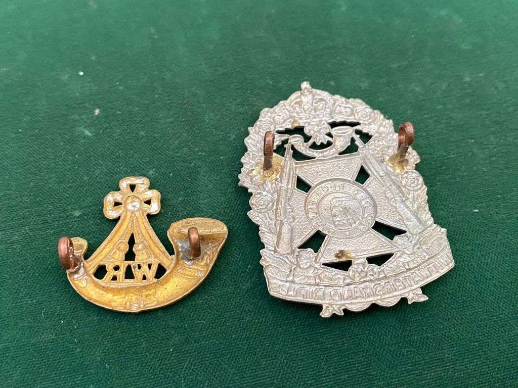 WITWATERSRAND RIFLES HELMET PLATE AND ONE COLLAR-WORN 1913-1963-LUGS COMPLETE