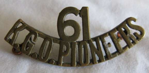 61 K.G.O. PIONEERS BRASS TITLE - RAISED DURING WW 1 FOR EVERY BRITISH DIVISION