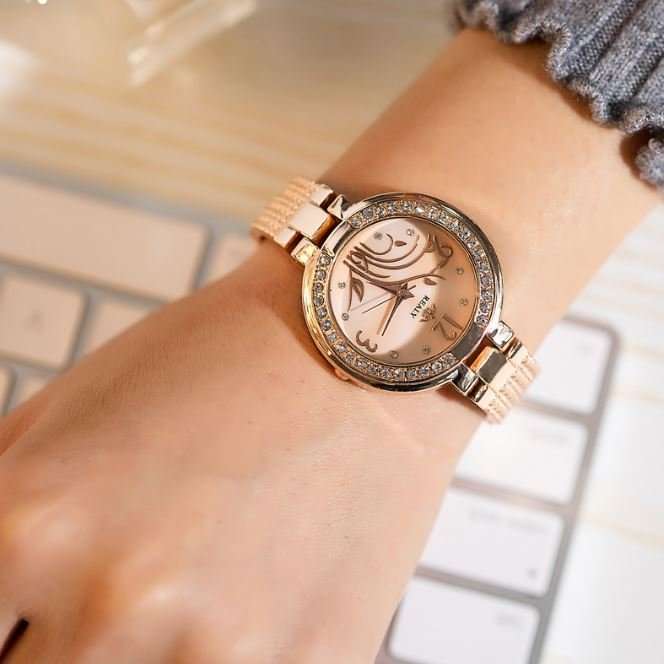 Elegant REALY Rose Gold & Rhinestone Ladies Wrist Watch With Stunning Inlay Detail