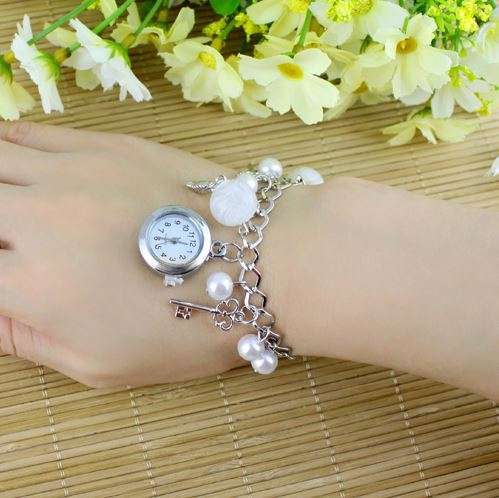 Elegant Silver Ladies Charm Bracelet Wrist Watch