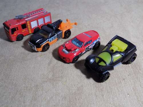 Four Hotwheels Die Cast Cars for One Bid