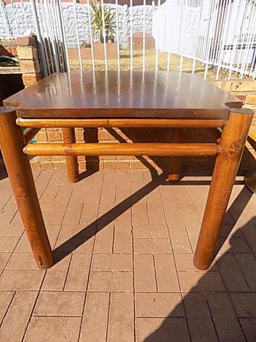 Stunning Square Wooden Table with Solid Round Legs