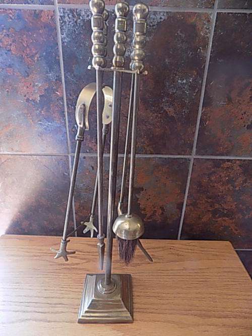 Impressive Brass Four Piece Fire Place Set