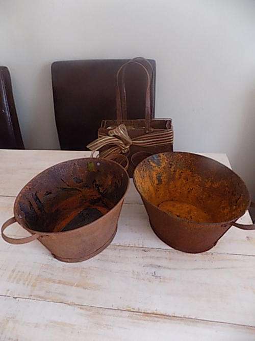 One Rusted Basket and Two Rusted Buckets